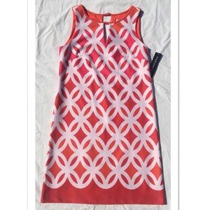 Knee length orange, pink, and white shift dress